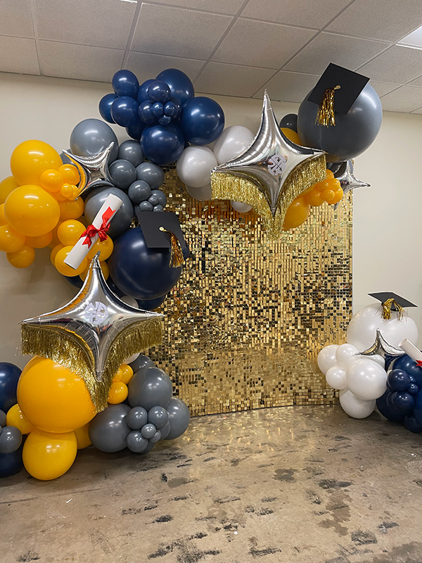 gold backdrop graduation garland