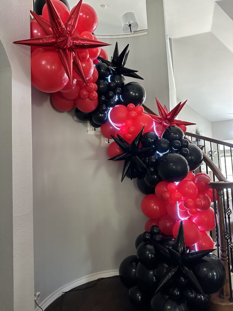 organic balloon garland on staircase